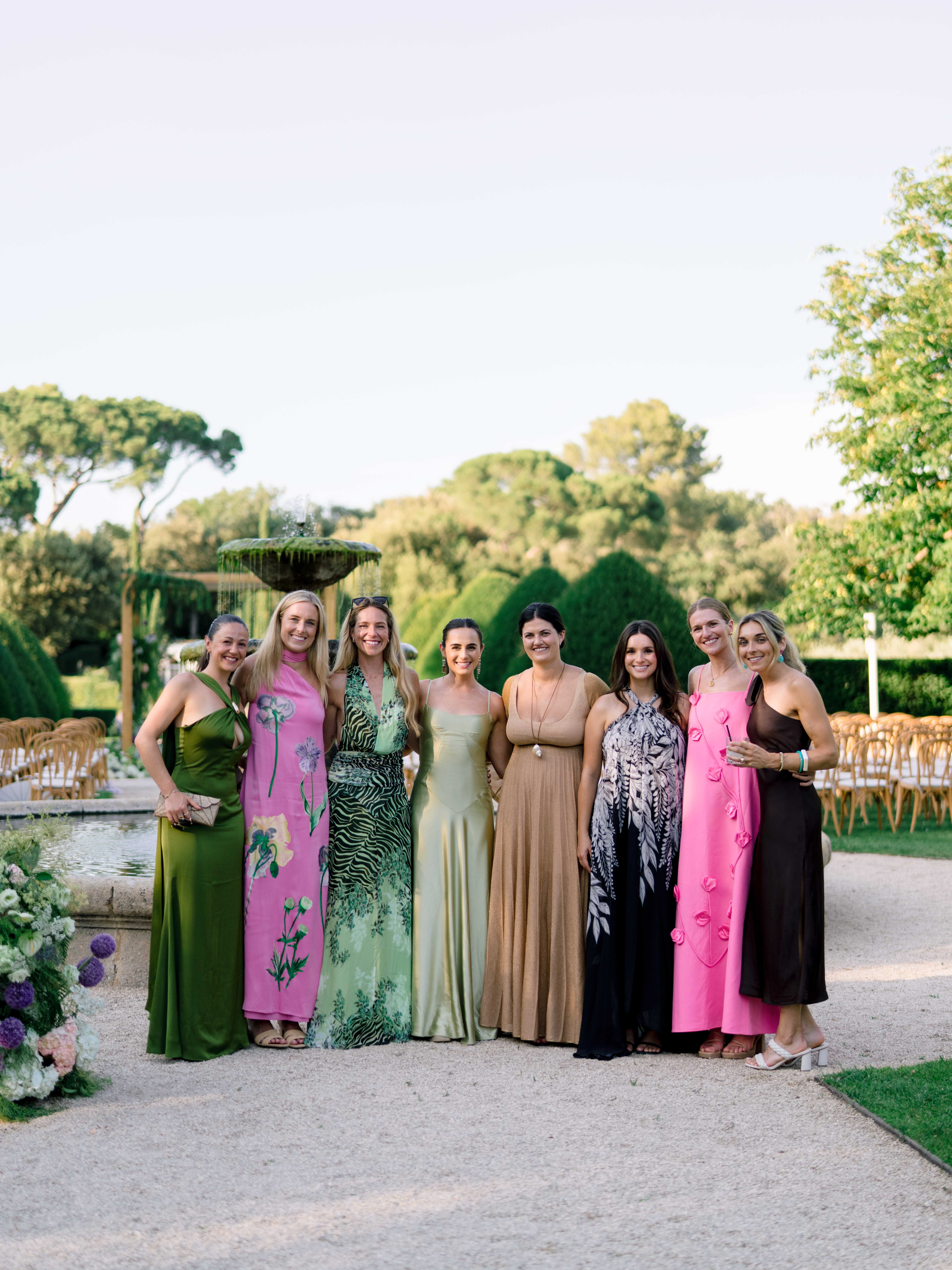 Wedding guests gathered in the gardens of Villa Baulieu